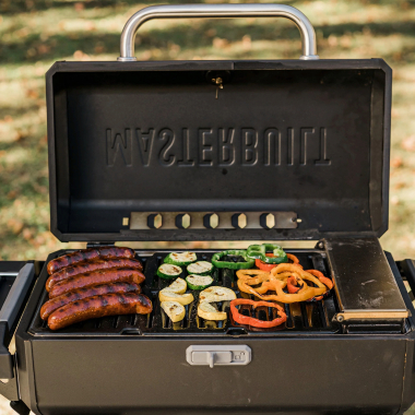 Masterbuilt Tragbarer Holzkohle Grill und Smoker mit Wagen
